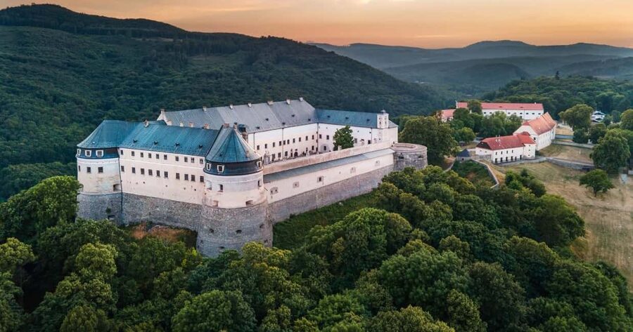 Castles, Čičmany & Bratislava - Beckov Castle ruins on a cliff, and the Smolenice swap in winter